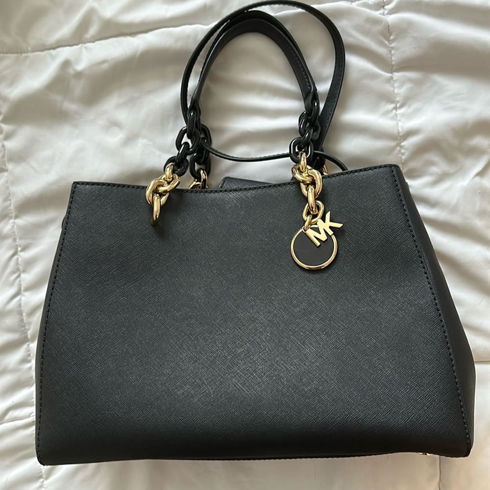 2018 Michael Kors large black leather handbag.